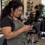 Las Vegas salon owner responding between appointments