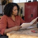 Landscaping owner reviewing a license application